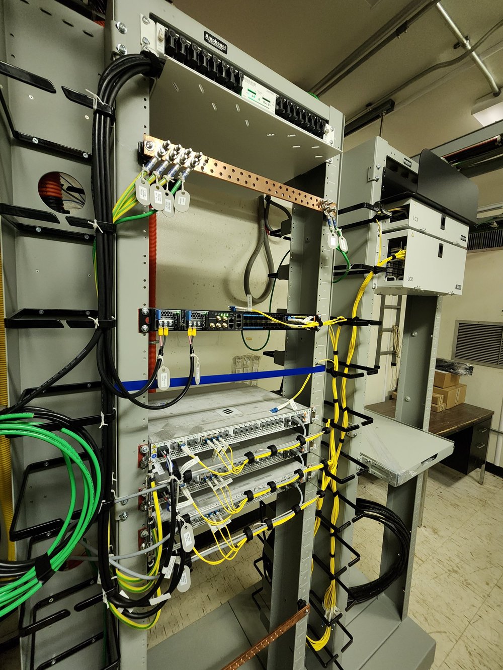 Fiber and network rack with neatly dressed cabling