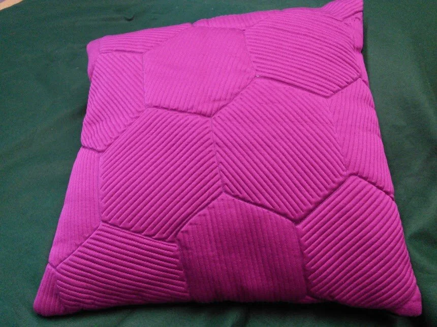 Pink hexagon quilted cushion 44x44cm.jpg