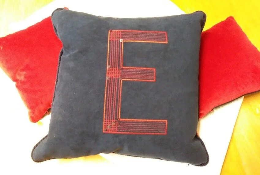 Red 40cmembroidered and beaded cord edge cushion.jpg