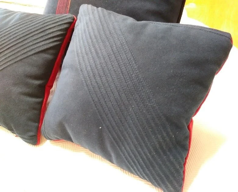 Navy novasued quilted front 25cm cushion.jpg