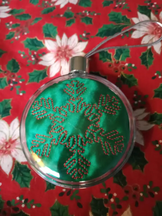 Green silk red outline snowflake.jpg