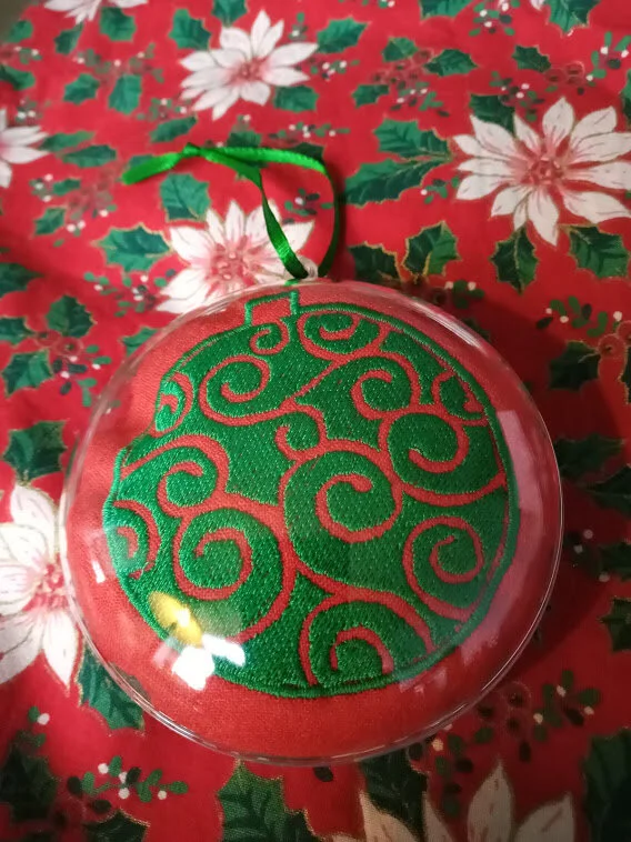 Red solid green scroll bauble.jpg