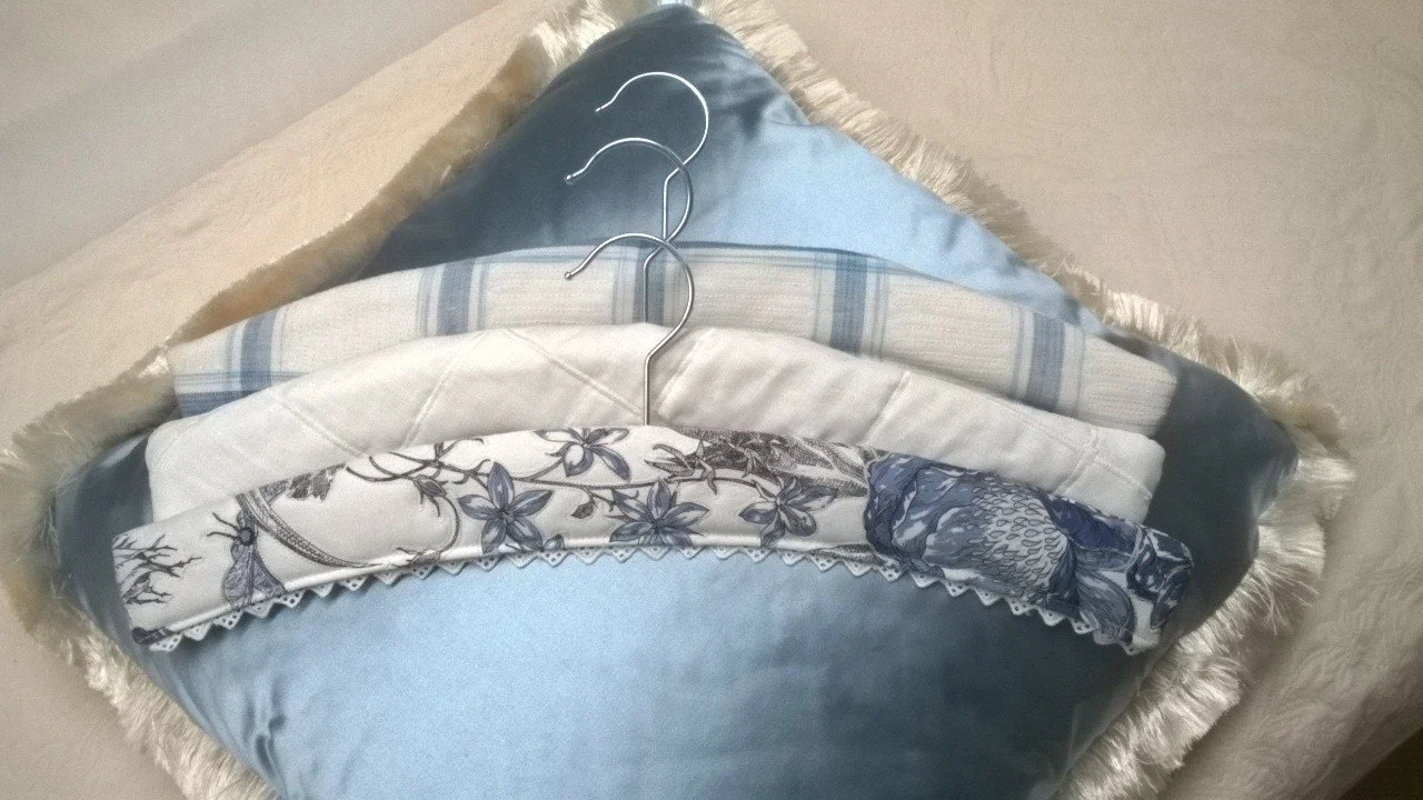 Quilted Hangers on silk cushion.jpg