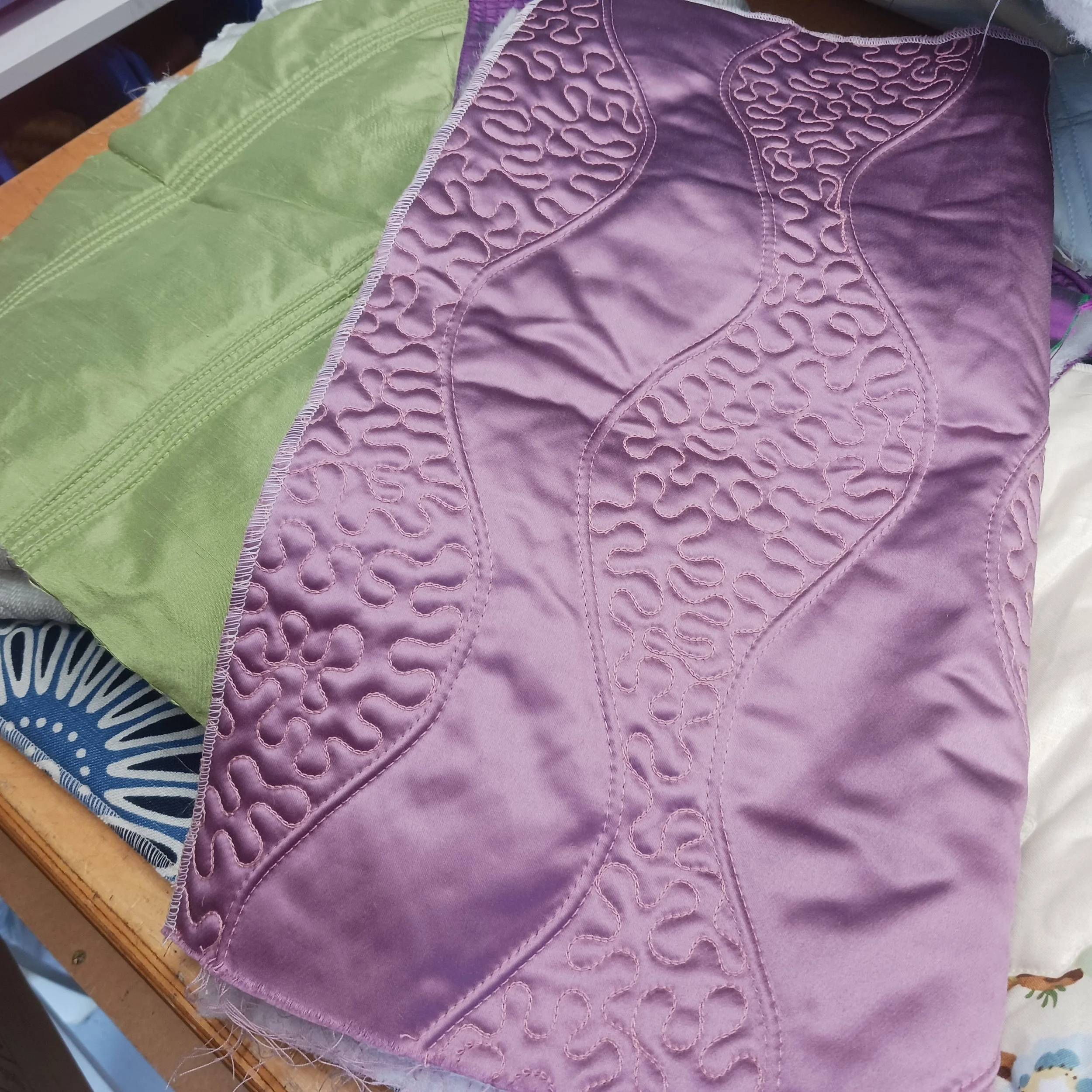 Satin quilted in vermicelli & italian wavy channel.jpg