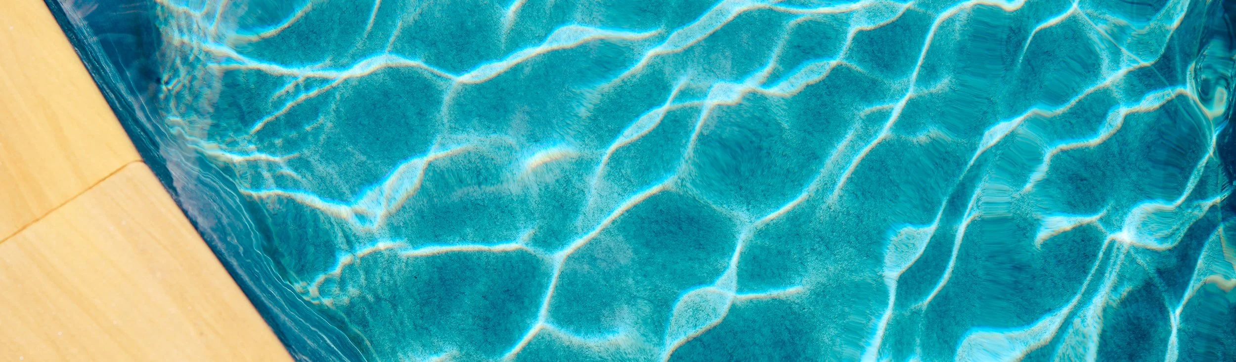 vecteezy_abstract-pool-water-swimming-pool-bottom-caustics-ripple_27055297_579.jpg