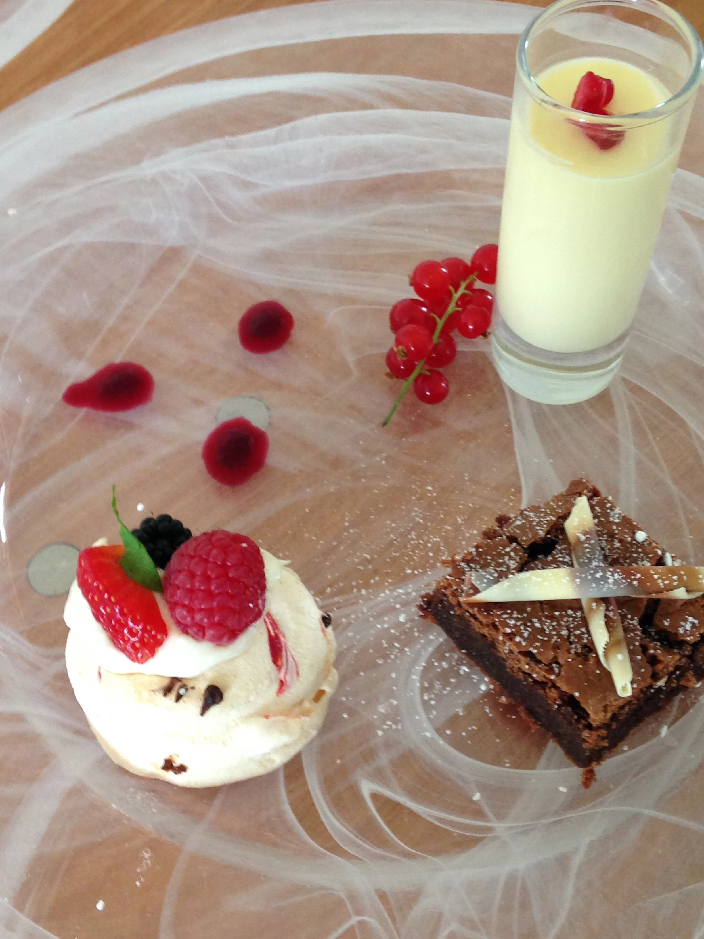Trio of chocolate brownie, lemon posset and meringue nest