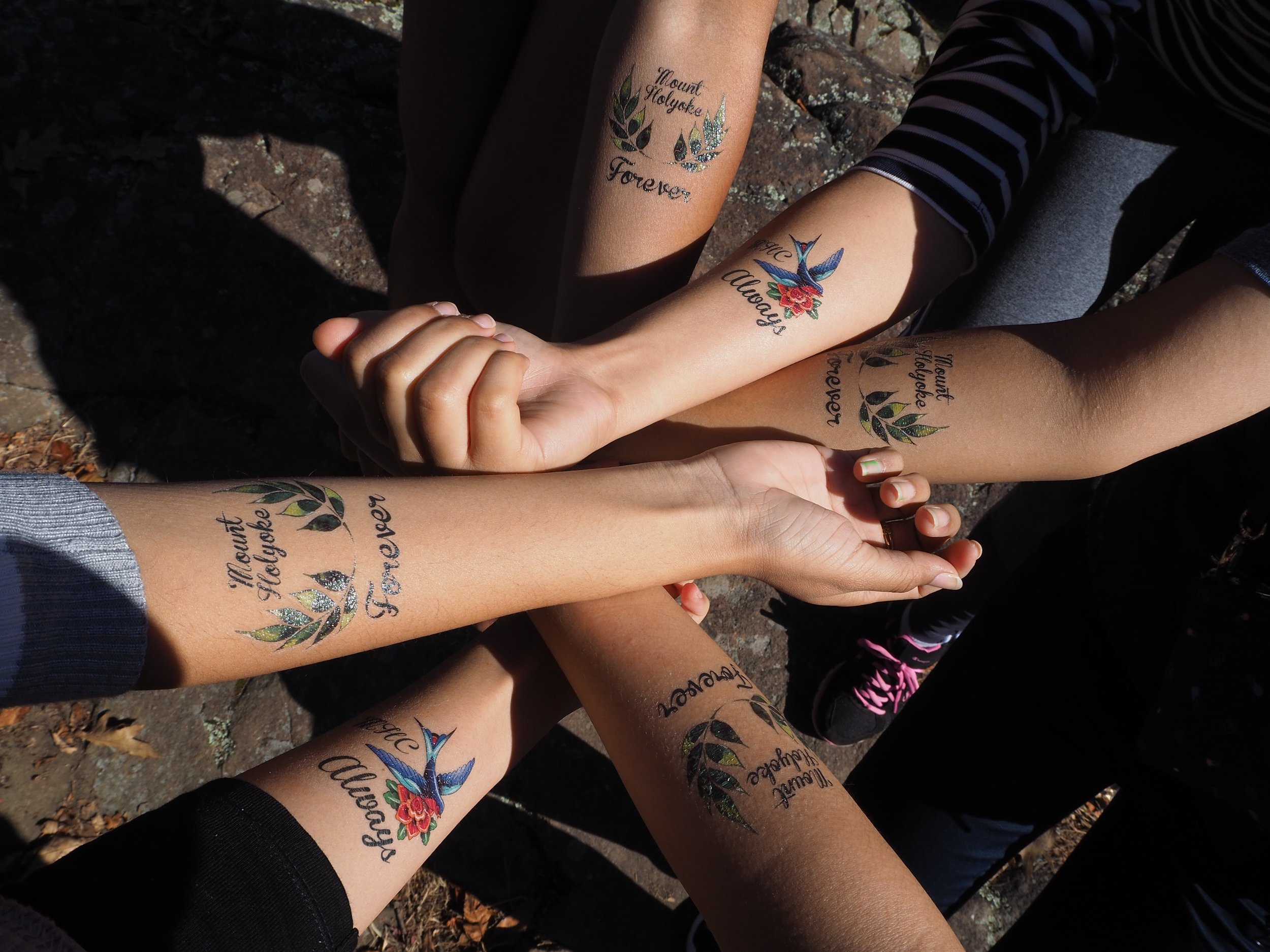  Photo by Tammy Vesvarute ’21  MHC students flaunted their temporary tattoos. 