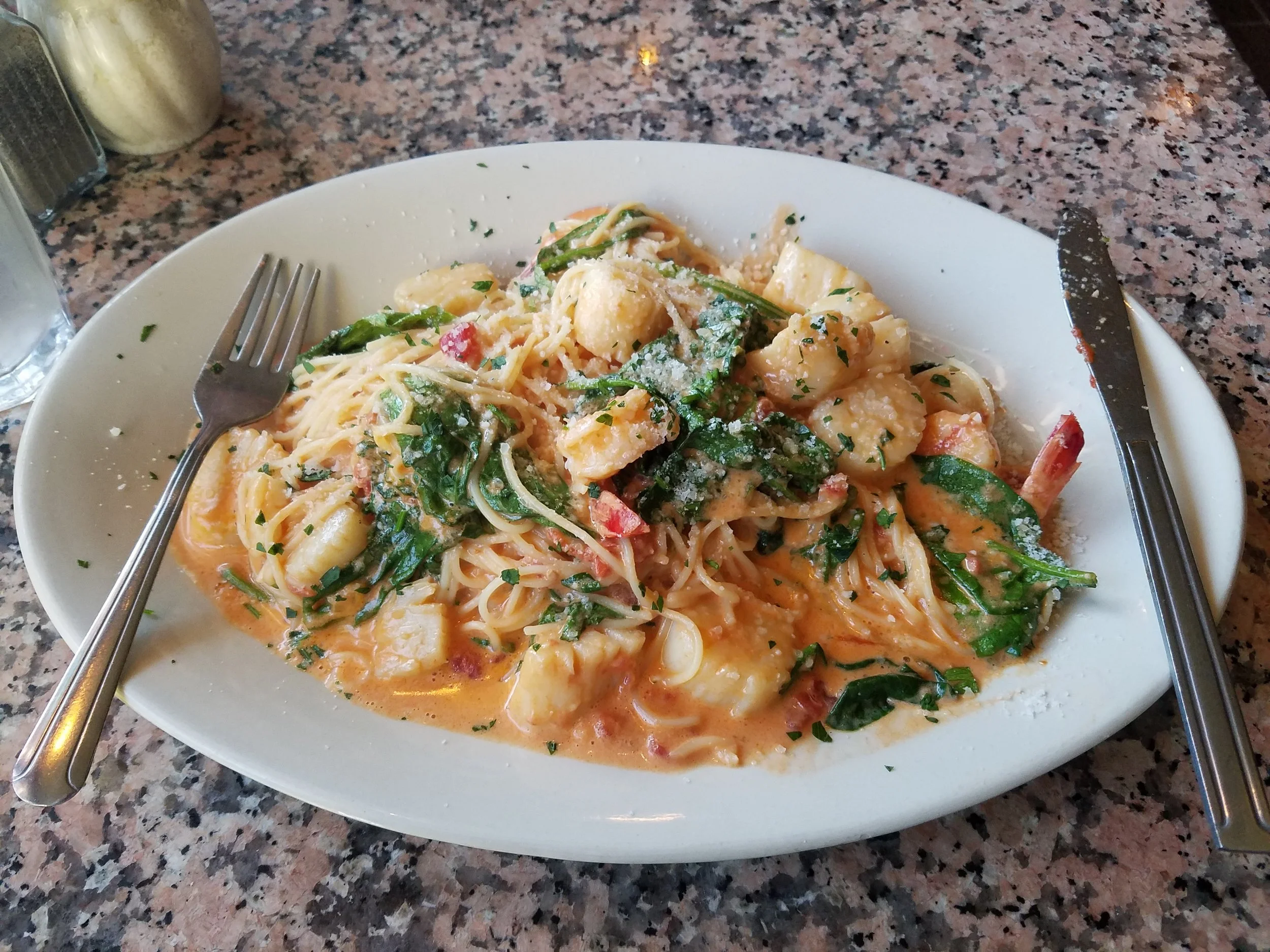 Photo by Sarah Paust '20 Pasta E Basta's spaghetti with scallops, shrimp and spinach in a tomato cream sauce, ordered by the author.