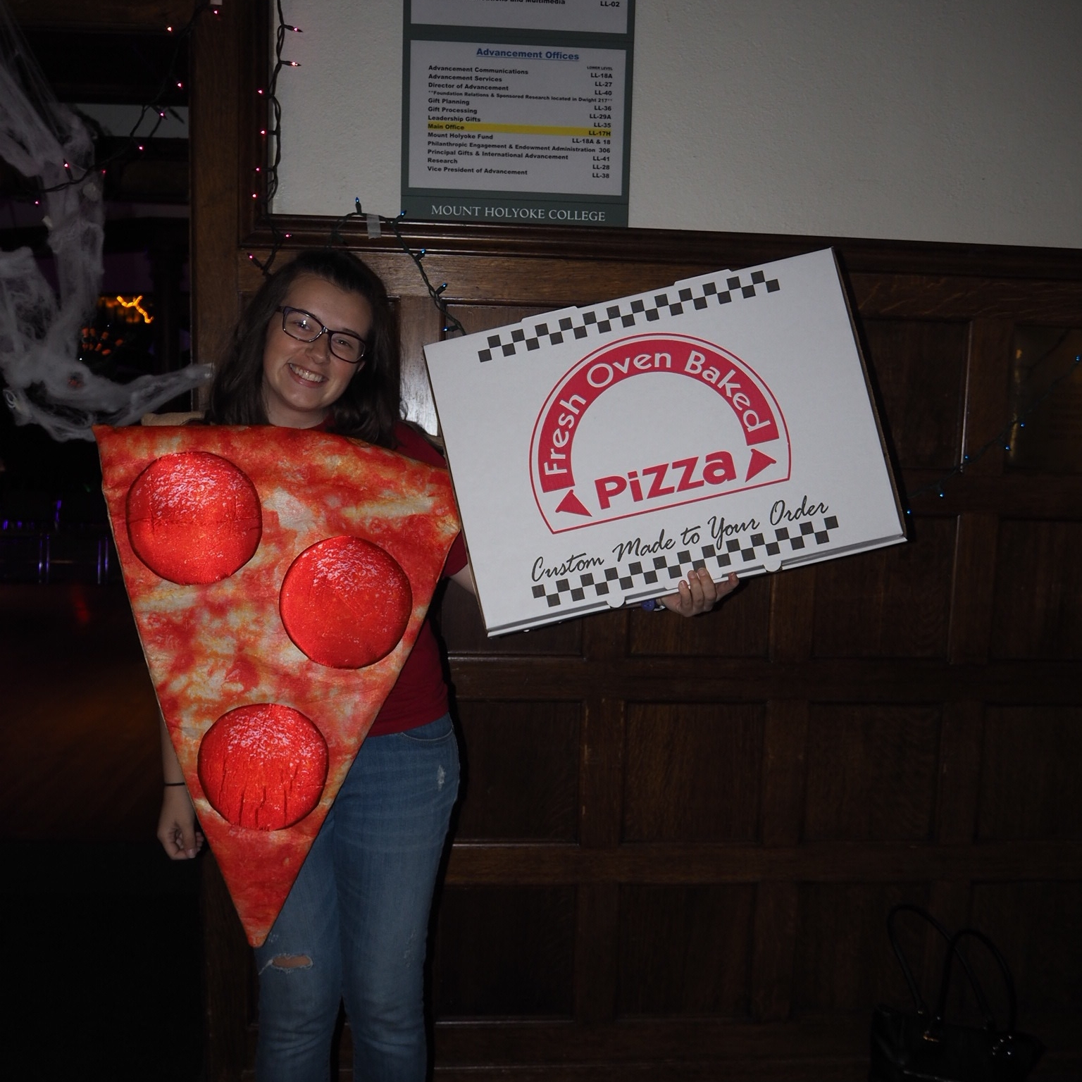 Student Event and Special Programs Coordinator Riley Fickett dressed as a slice of pizza on Saturday.
