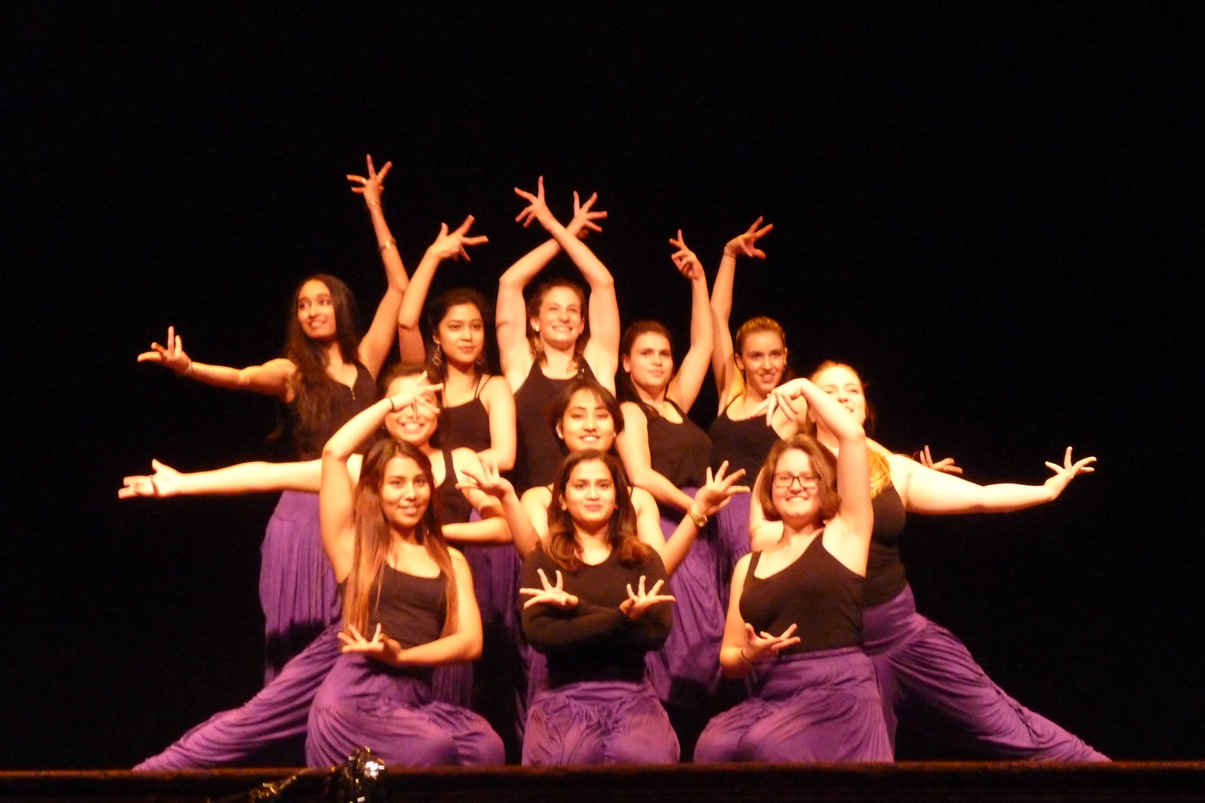  Photo by Gabby Raymond ’19  TAAL finishes their last dance with a fusion-inspired flourish of arms. 