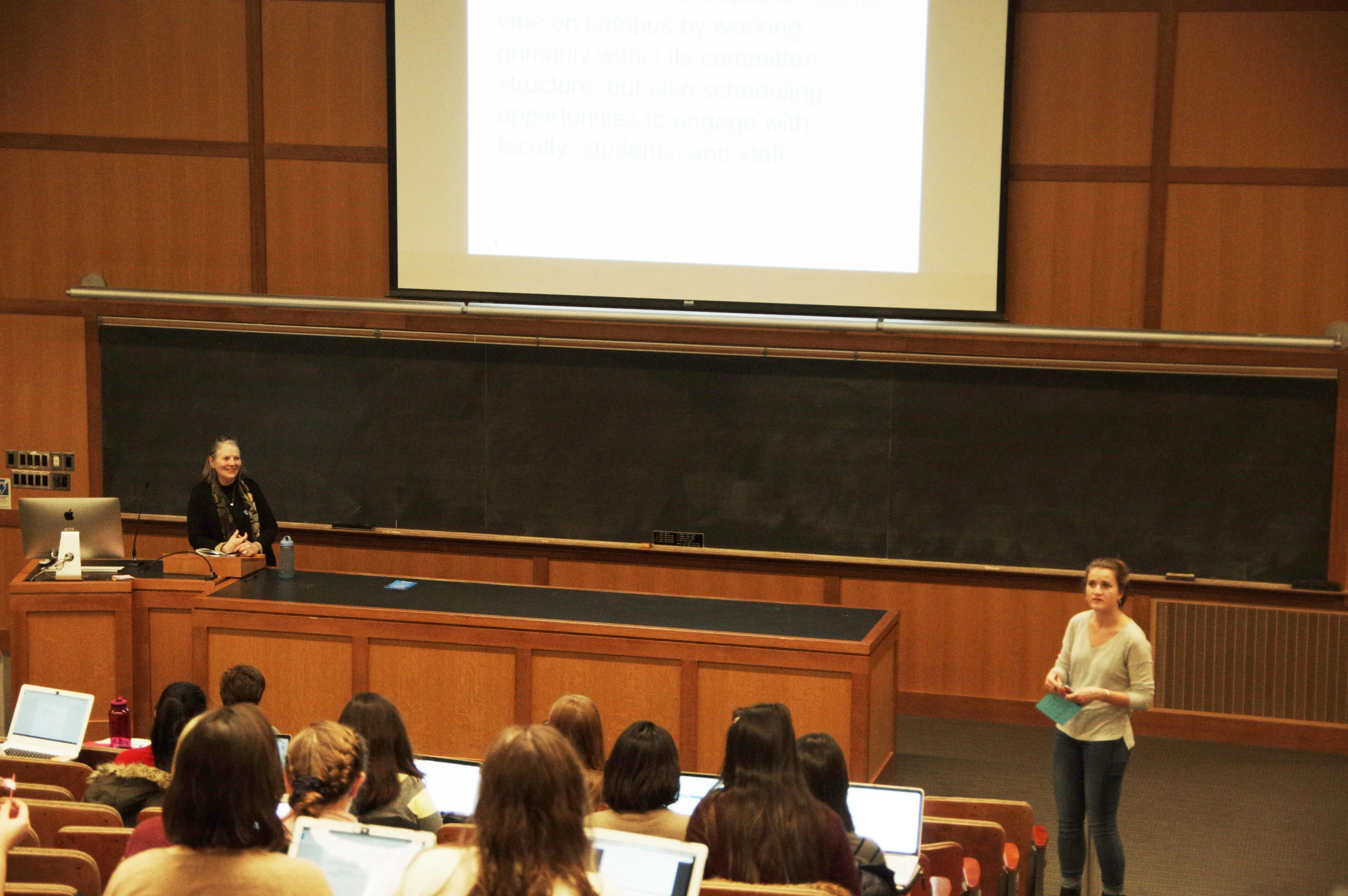 Photo by Casey Pan ’18 Lenore Reilly listens as Liz Brown ’20 takes questions from students regarding the Board of Trustees.