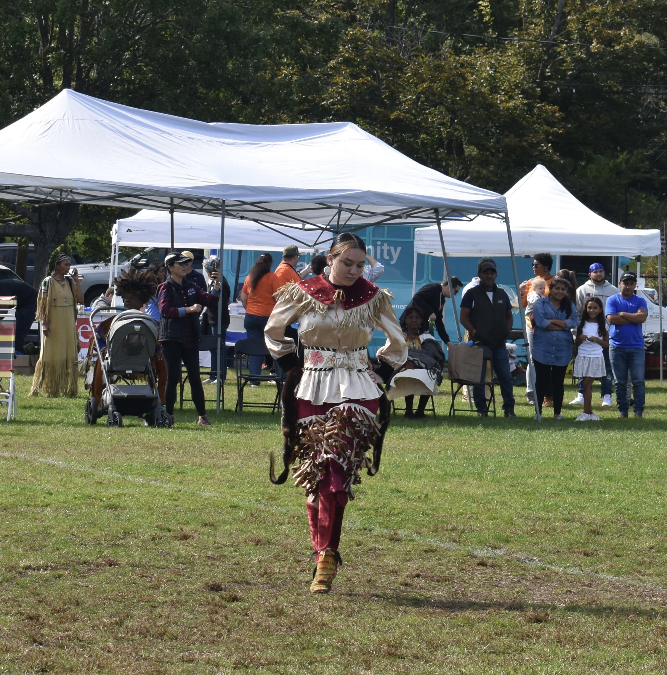 FEATURES_ A jingle dancer doing a pow wow dance at the IPD Celebration in Newton by Emma Quirk '26.jpg
