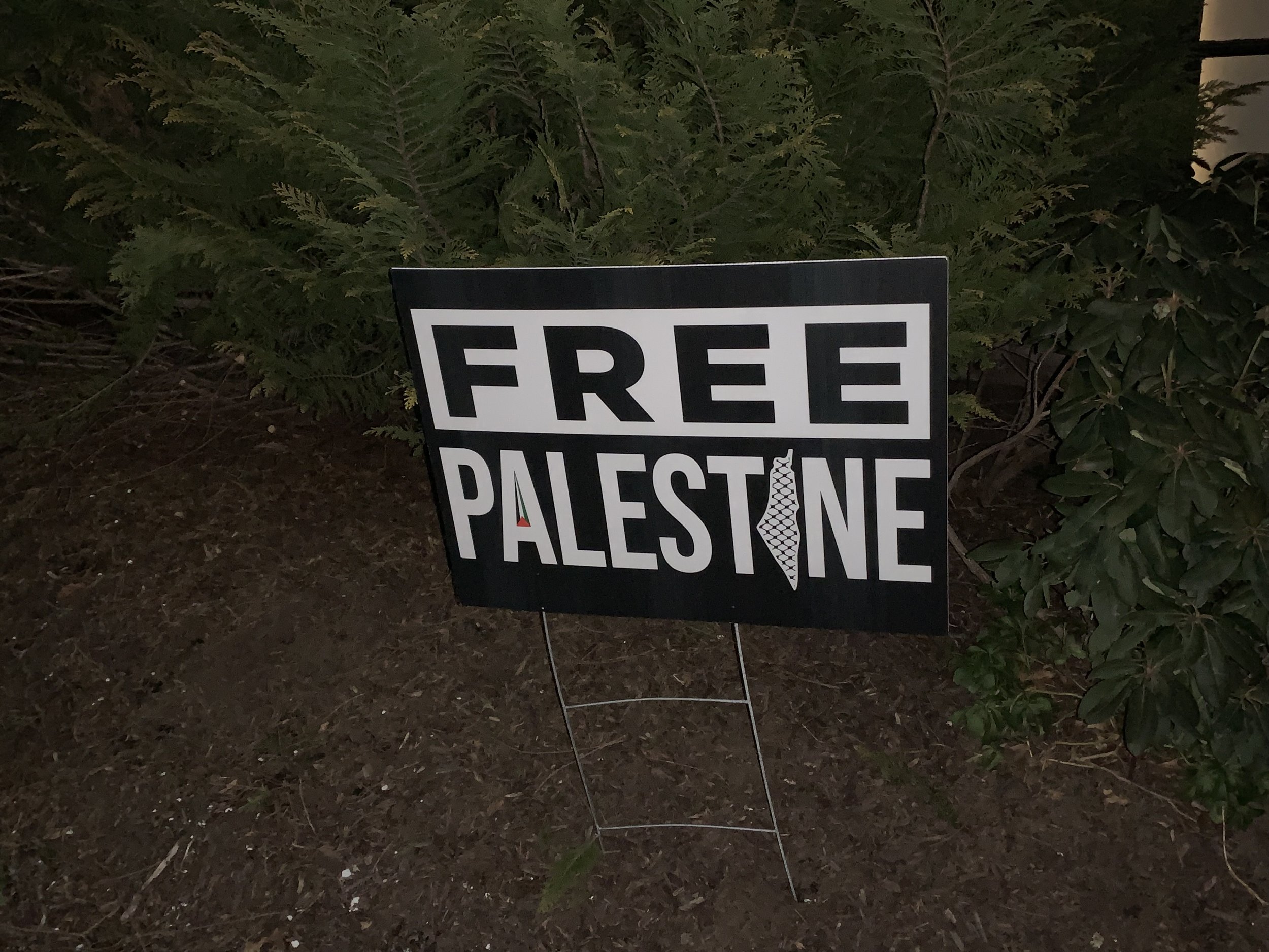 FEATURES_ Close-up of _Free Palestine_ sign beside the walkway of Porter by Melanie Duronio '26 (2).jpeg