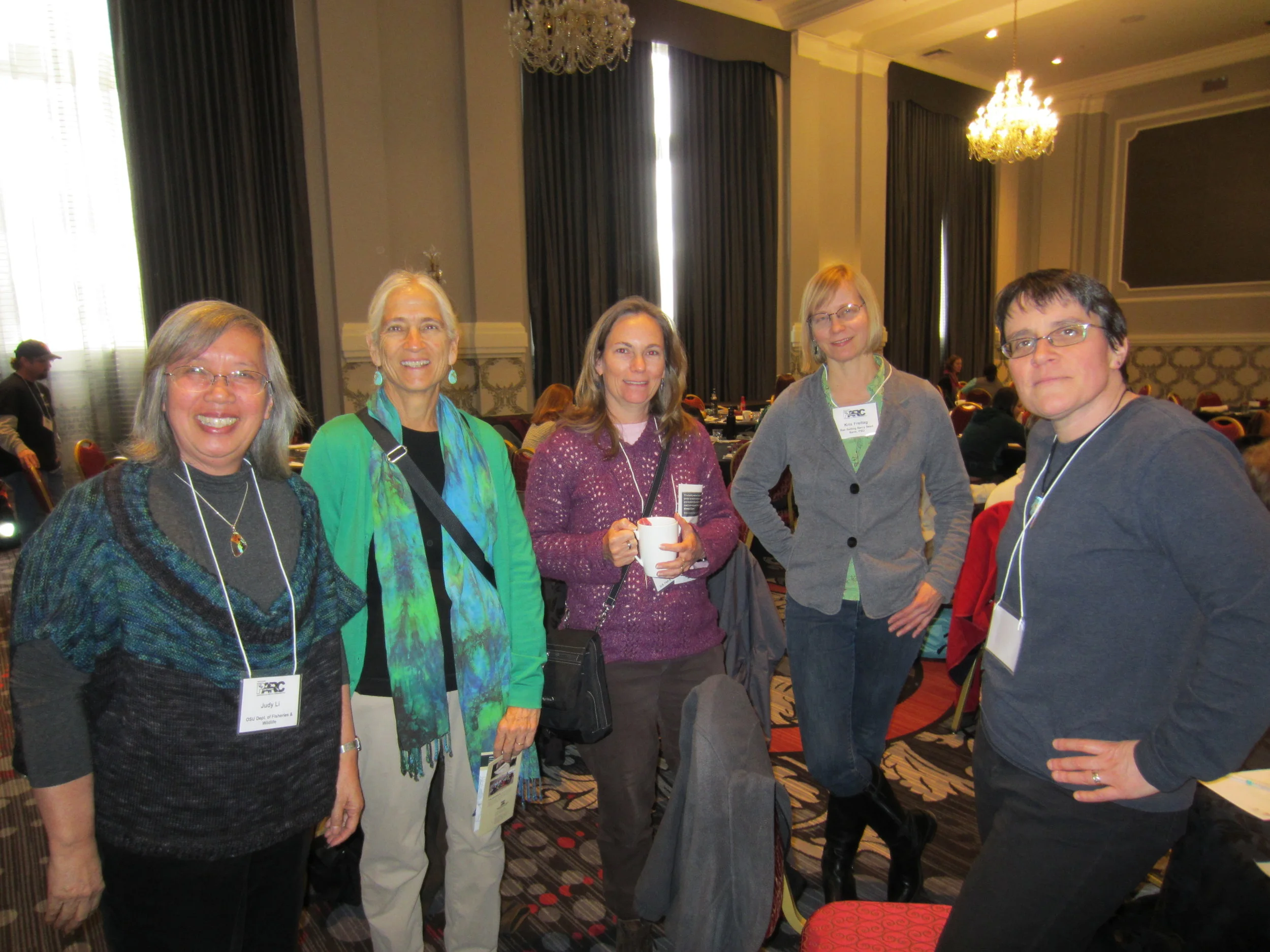 Sharman Apt Russell (second from left) and Celeste Searles Mazzacano (far right) with meeting participants.