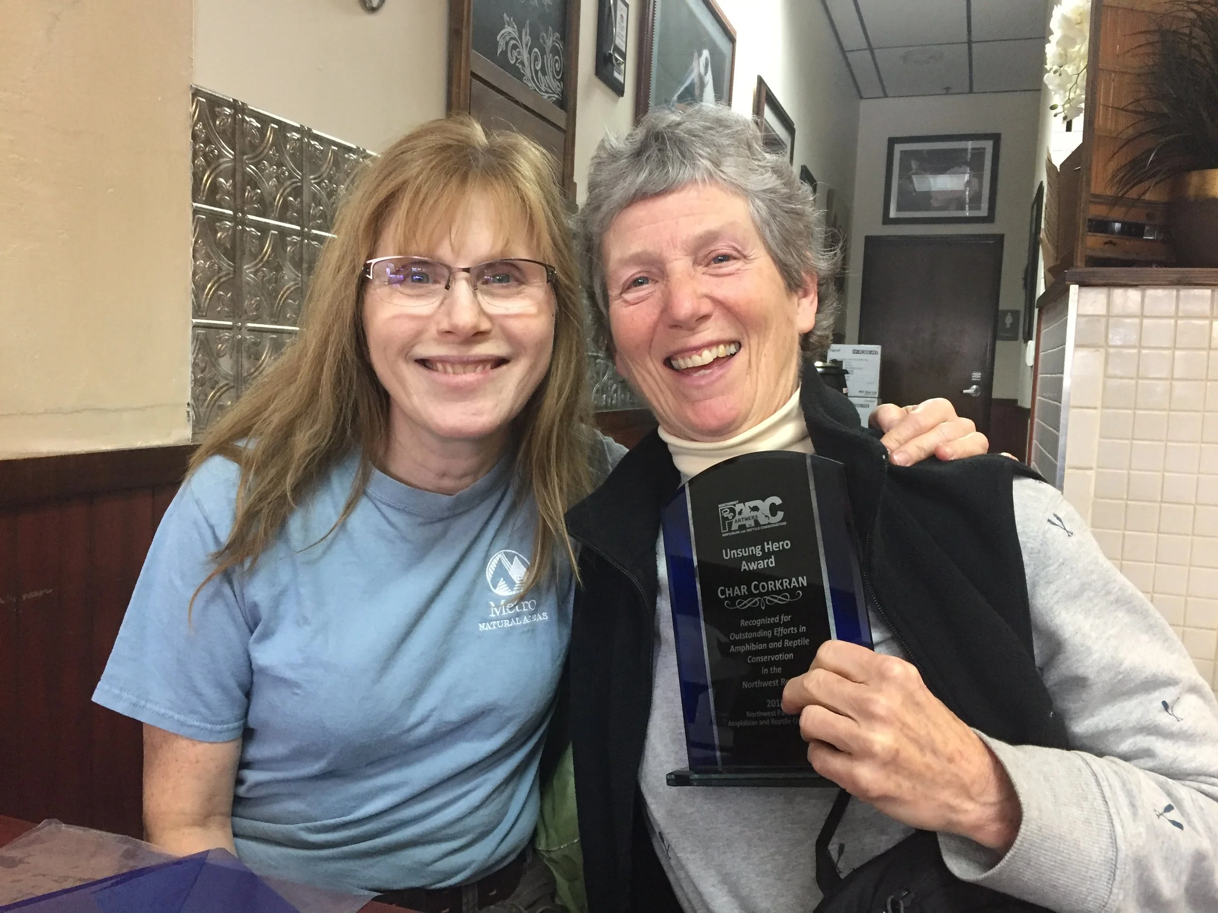 NW PARC co-chair Katy Weil presenting Char Corkran with her award