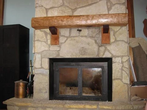Hand-hewn cherry mantle, purple heart corbels custom made for a fireplace in Chillicothe