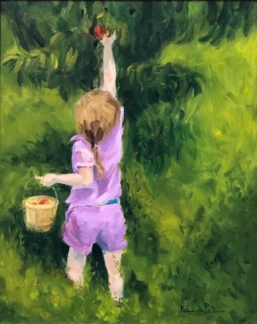 Tessa Picking Peaches