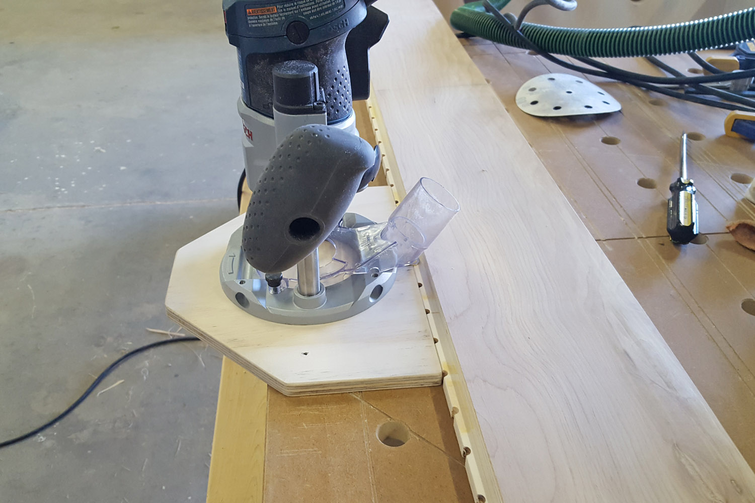 Shelf pin hole jig with Colt router - CG&H Builders Inc.