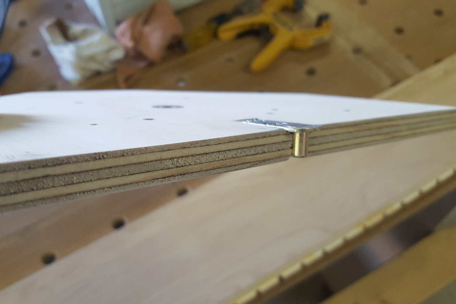 Shelf pin screwed to jig base - CG&H Builders Inc.
