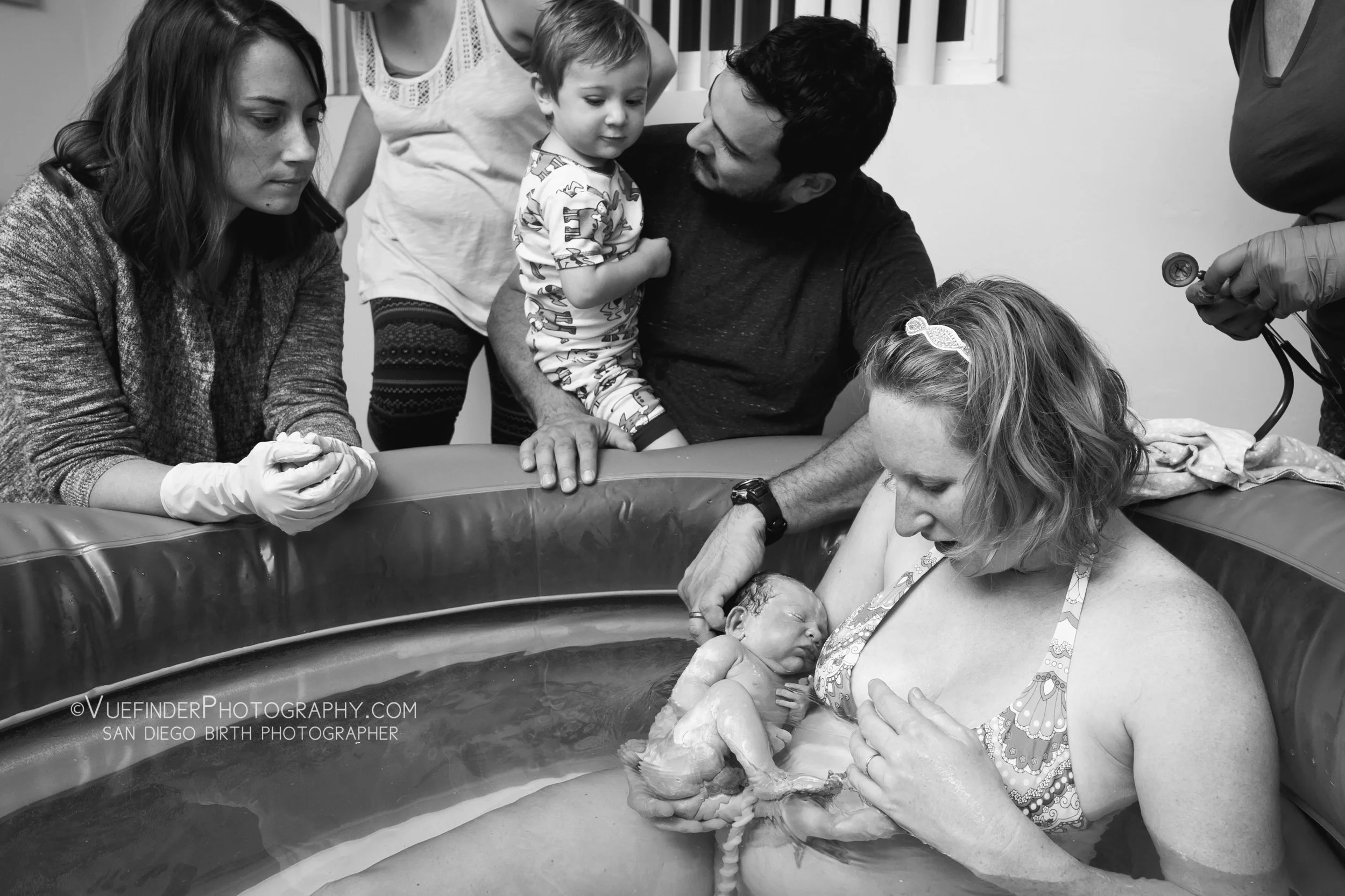 I’ve never seen a big brother fall in love so quickly. He was a bit sleepy and crying during the labor, but as soon as he saw his baby brother, it was love at first sight. PC: www.vuefinderphotography.com
