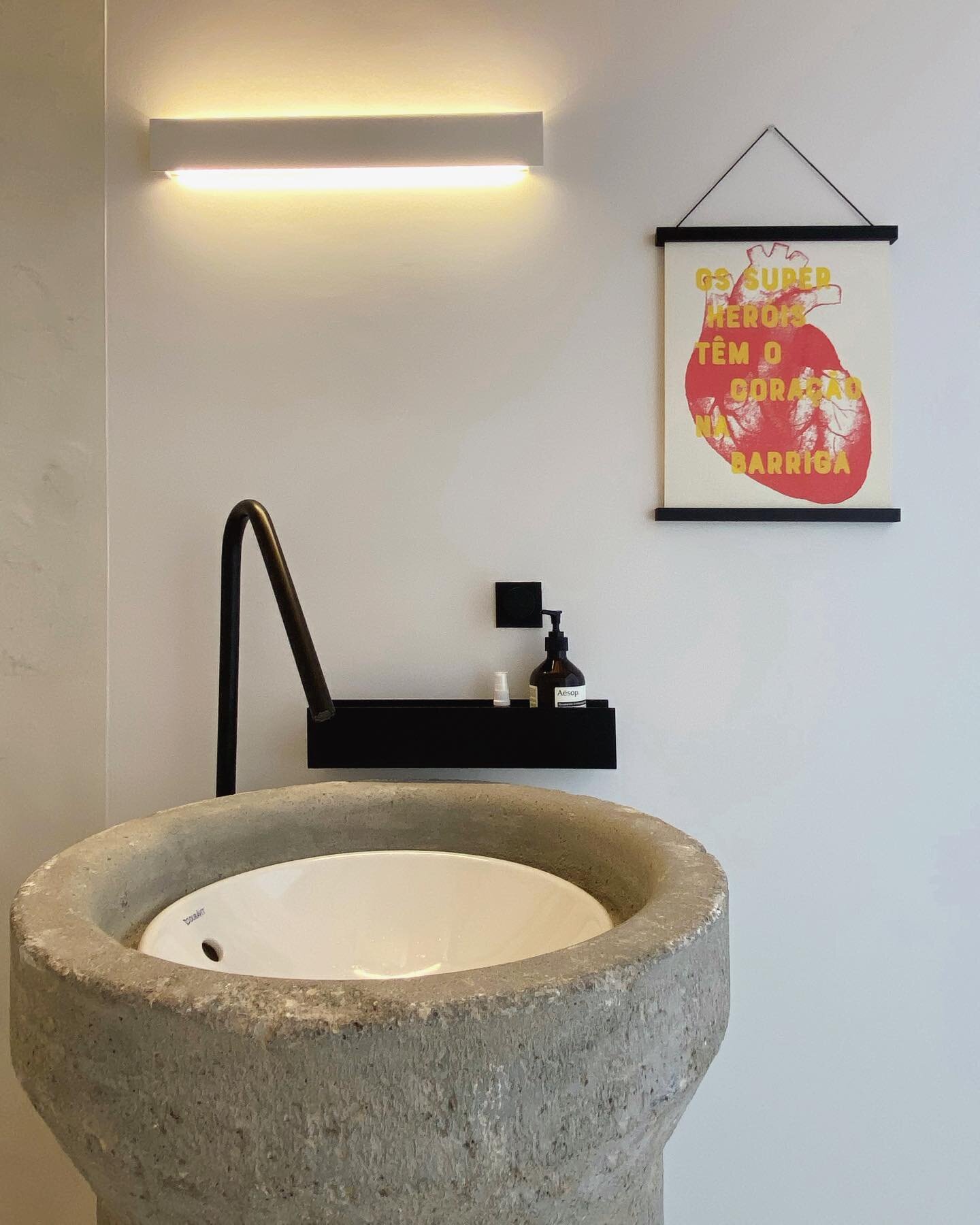 Bathroom in our studio. Inspired by construction waste, a concrete shackle and a recycled sink.