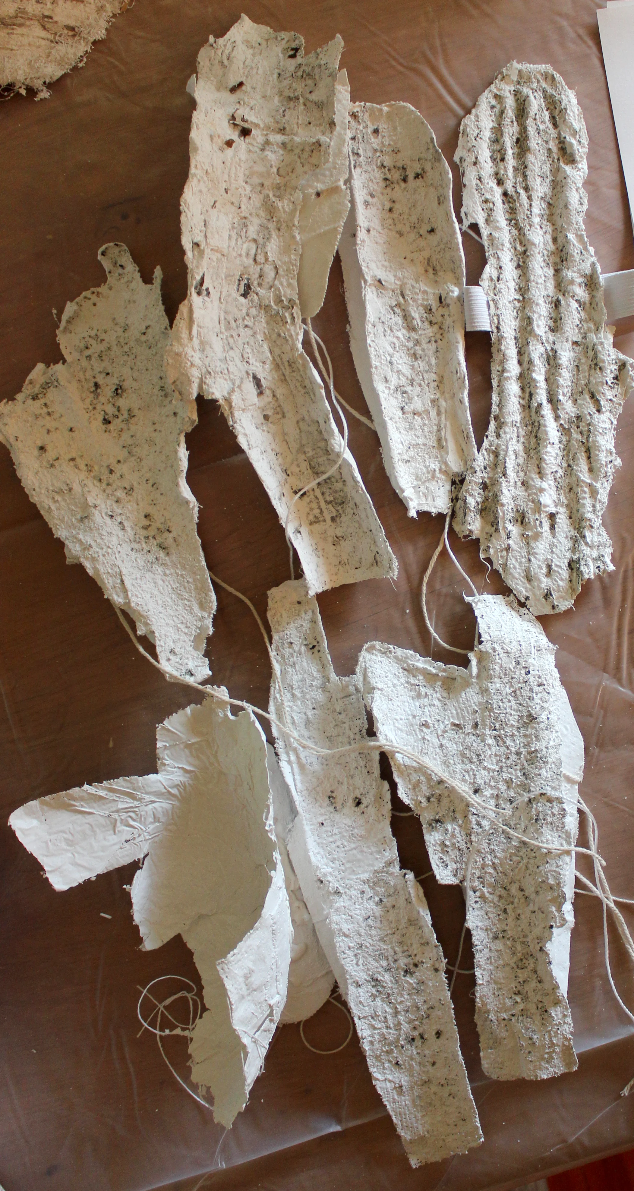 Plaster wearables, designed to wear during the first part of the performance.
