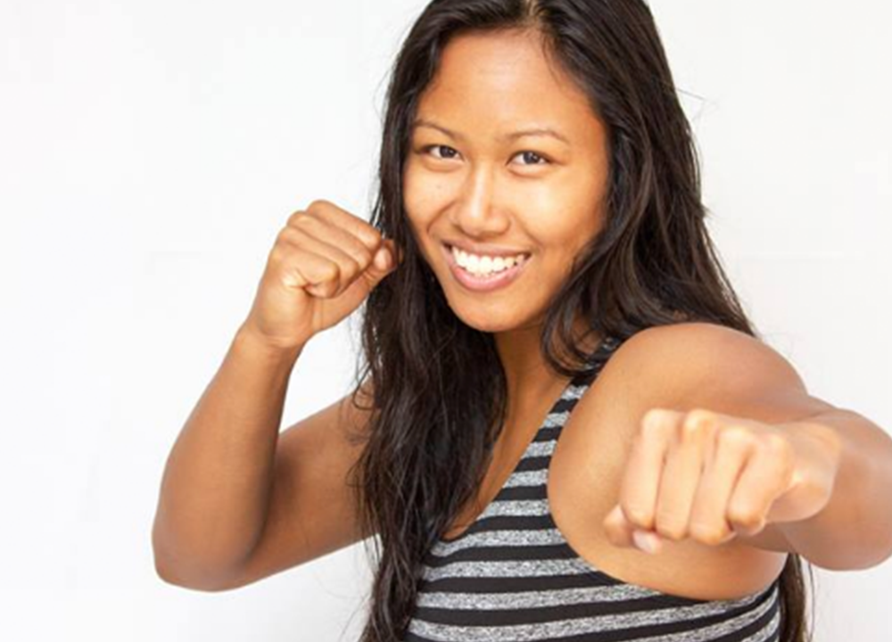 Savannah Em: Illustrator and MMA Fighter with One Championship.