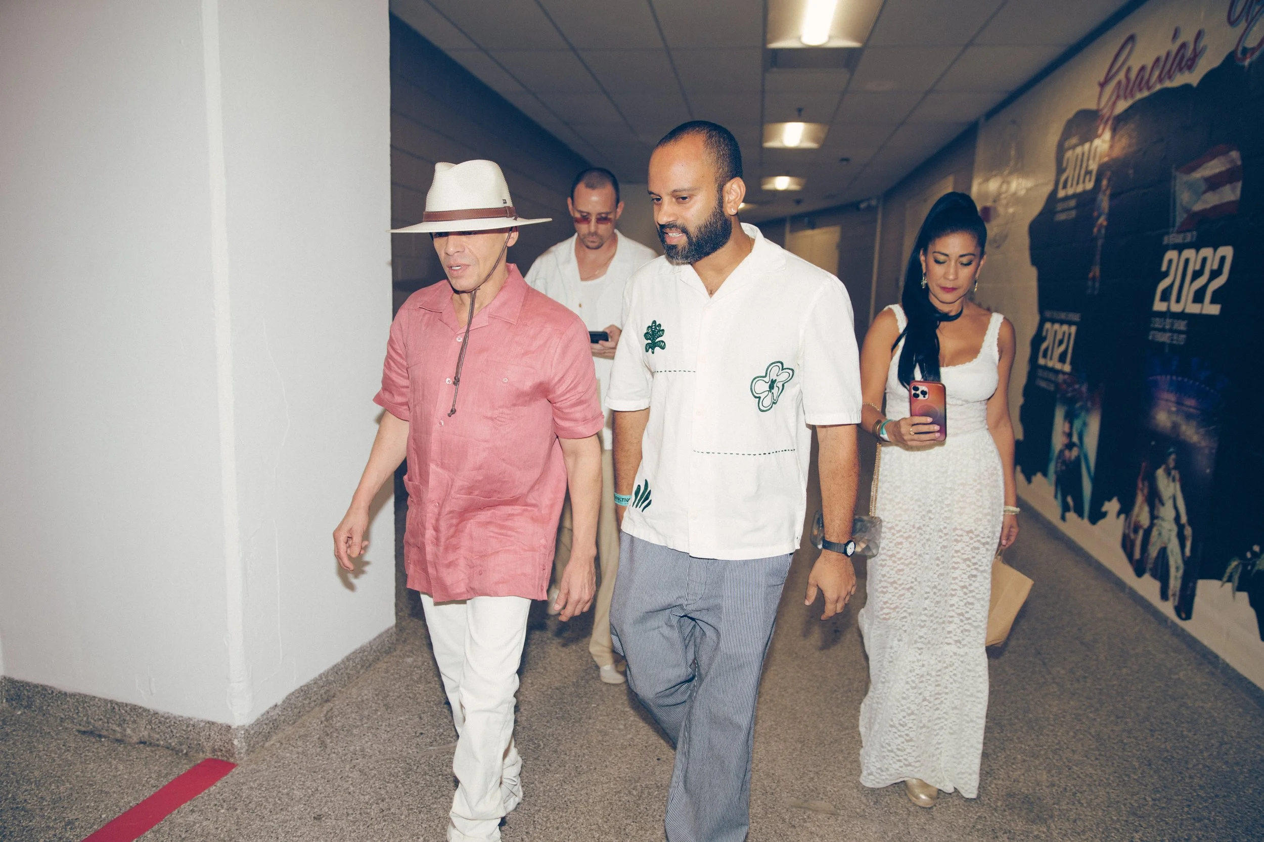 Music and entertainment lawyer Silvino Edward Diaz, of Starving Artists, alongside client and music legend Vico C, and Buena Vibra Group, backstage at Bad Bunny concert in Puerto Rico