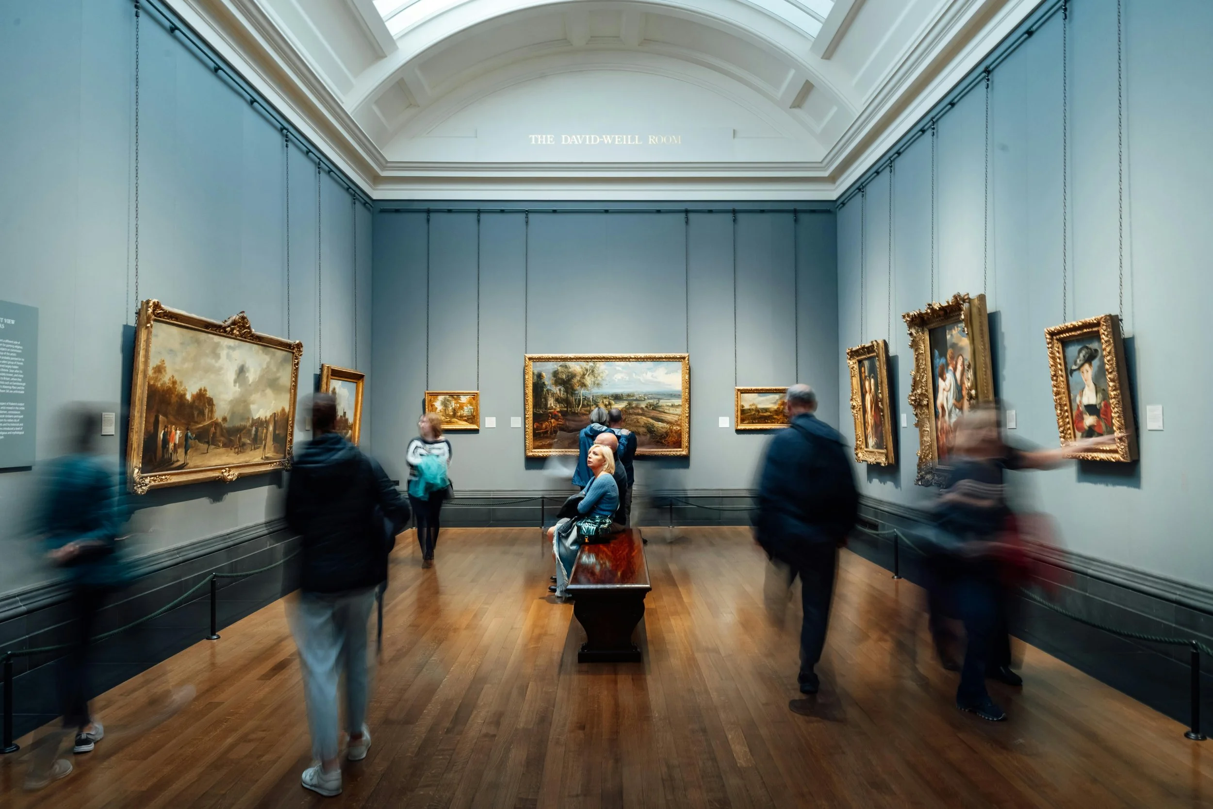 Museum gallery interior representing legal and operational aspects of museums