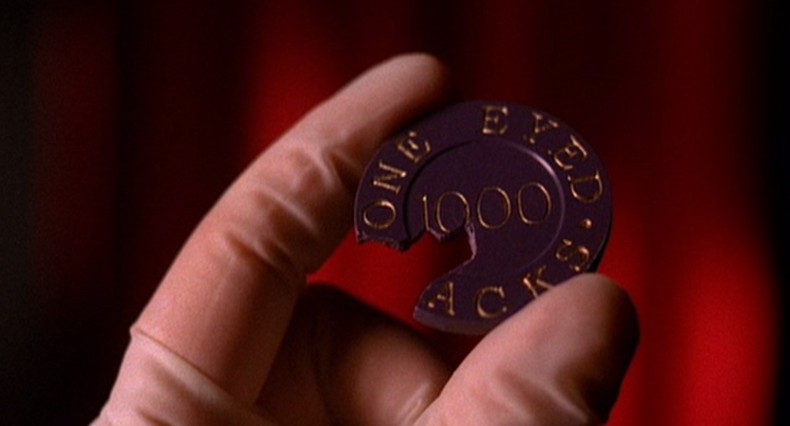 Cooper holding the casino chip in season 1. 