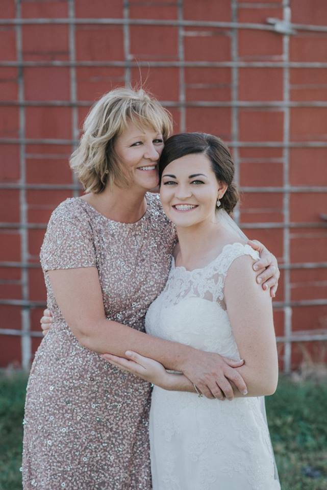 Kayla - I have known Kayla for years, like since we were in elementary school! We graduated together and I had followed her love story on the book over the past couple of years so when she asked me to do her hair & make-up for the big day I was honored!! Kayla has shoulder length hair but it pulled together flawlessly for her elegant up do. Her veil sat right on top for the ceremony but easily converted to being tucked under her do for the reception. Make-up for both the bride & the mother of the bride was very clean & classic. They both looked gorgeous! Photo by the beautiful Nicole Renee Photography 