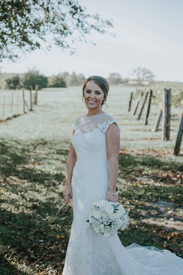 Jessica - can we just ooh & ahh over her contour and copper eye for a minute?! I mean really, she looks perfect! We went with a low detailed hair style complete with a few twists, but no braids! She didn't want to see a bunch of braids; had me cracking up. Perfectly styled, for the perfect wedding day! 