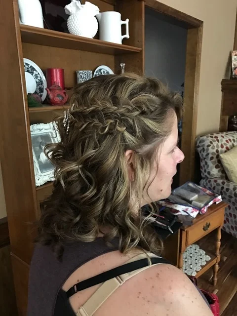 The one thing the bride wanted was braids of some sort for everyone, so we did a double braid for this bridesmaid. Her curls were so perfect I had to leave part of it down!!