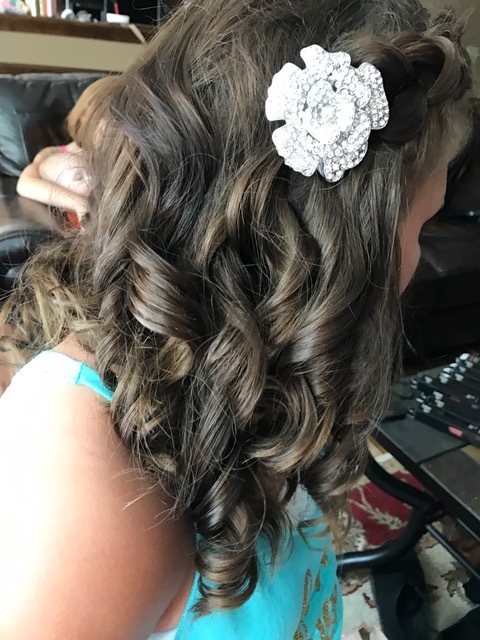 Junior Bridesmaid: Such a pretty girl!! She was so helpful all day long and kept her hands out of her curls for the entire day. We braided her bangs back and the bride made the clips - so fun!