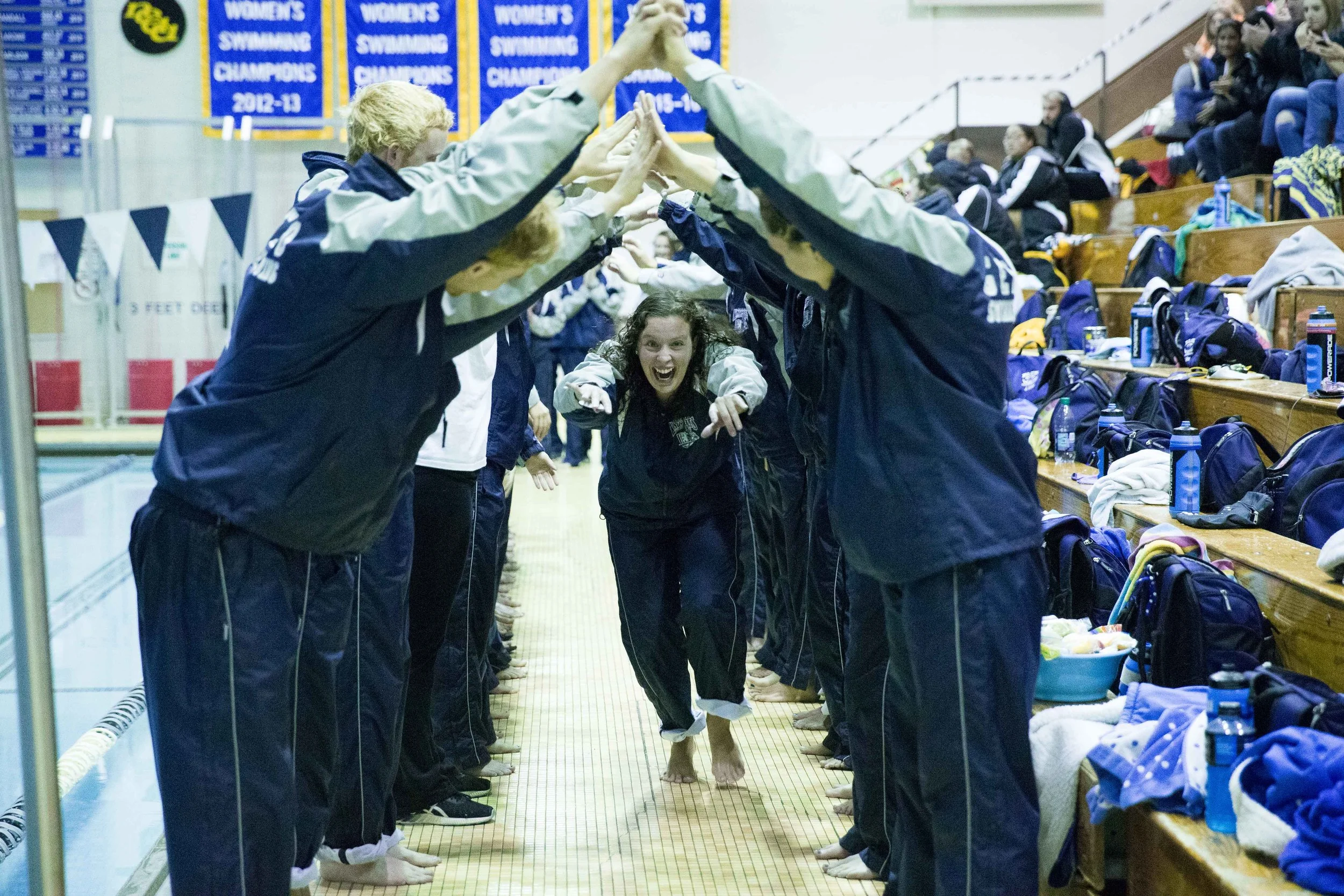 The Geneseo Blue Wave swim team gets hyped up before the start of their home invitational on Saturday Jan. 28. Both sides had a successful meet; the men took first place out of six teams, while the women took first out of five teams. (Keith Walters/Campus Photographer)