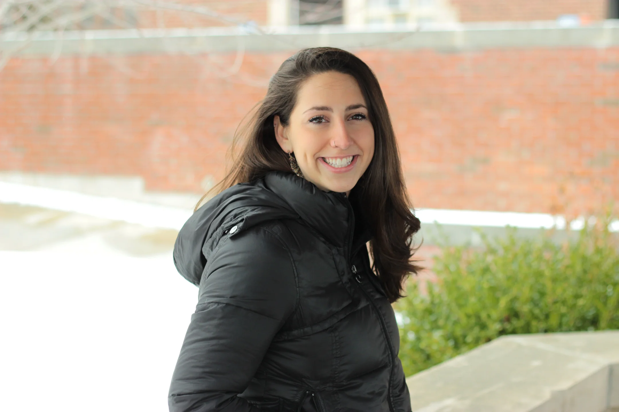 As an active member of the college community, psychology and communication double major senior Sophia Garber dedicates much of her time to helping people around her. Garber has decided to top off her four years at Geneseo by biking across the country in honor of those affected by cancer. (Sarah Hashmi/Staff Photographer)