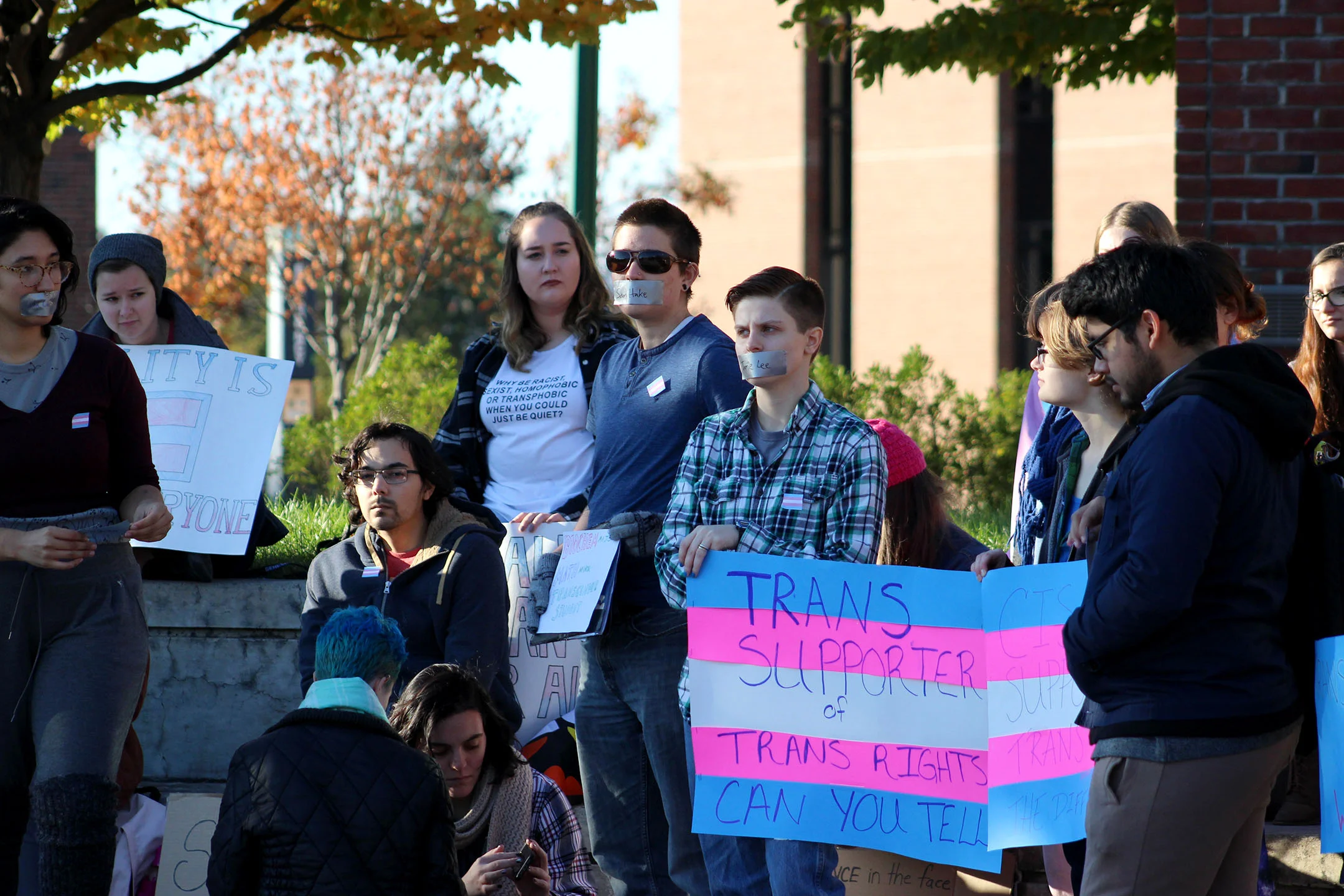 Students coordinated a rally in front of the Integrated Science Center on Wednesday Nov. 8. The group gathered partly in response to adjunct professor of sociology David Sorbello’s presentation entitled “FEMALE OR SHEMALE: CAN YOU TELL? “ but additionally expressed other grievances about the college’s policies regarding transgender members of the campus community. (Ellayna Fredericks/Assoc. Photo Editor)