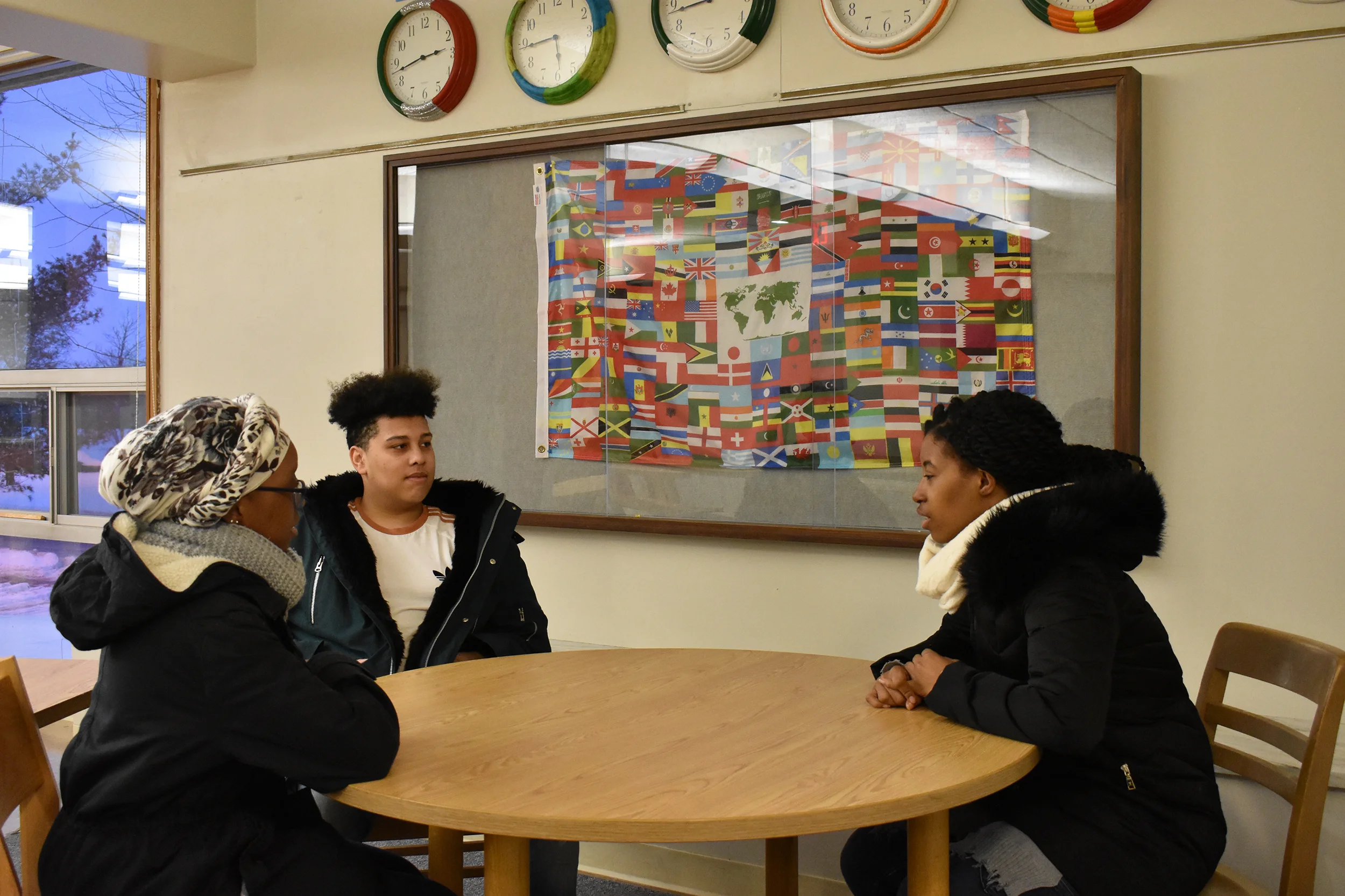 International relations major junior Shekiqua Reid (pictured right), communication major junior Luc Turnier (pictured center) and psychology major sophomore Oumou Wague (pictured left) sit in the common room of Wyoming Hall. Wyoming Hall is home to the Global House Living-Learning Community and in the fall 2018 it will house a new LLC focused on food culture. (Izzy Graziano/Knights’ Life Editor )