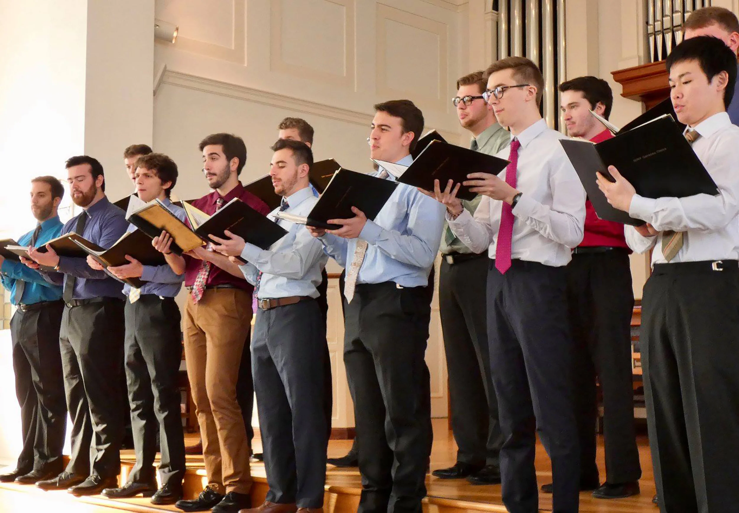 The Geneseo Men’s Choir (pictured above) performed alongside the Spectrum Singers and the Geneseo Chamber Singers on March 4 in the Central Presbyterian Church. Some of the pieces sung by the groups included “Wade in the Watah” by Ysaye Barnwell and “The Water is Wide,” a piece arranged by history and adolescent education double major senior Noah Chichester. (Sophie Yeomans/Asst. Copy Editor)