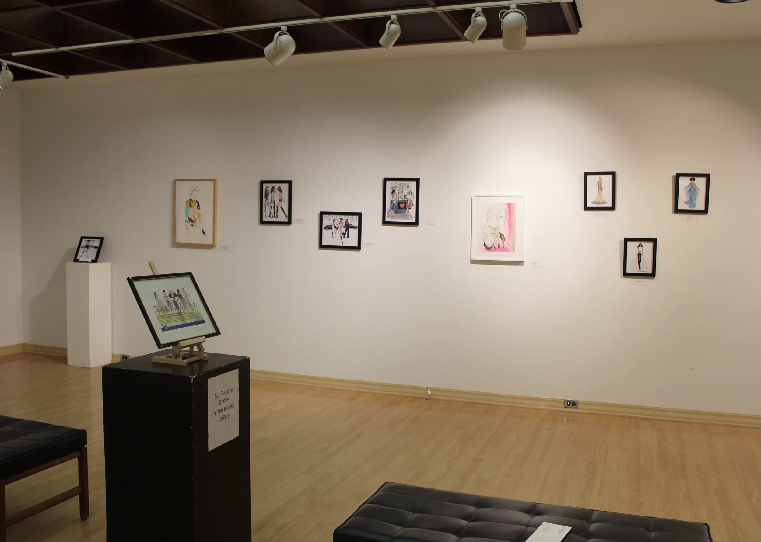 The “Fashion as Art” exhibit in the Kinetic Gallery (pictured above) opened on Thursday Nov. 1. This collection of illustrations shows fashion can be a form of creative expression (Catherine White/ Editor-in-chief).