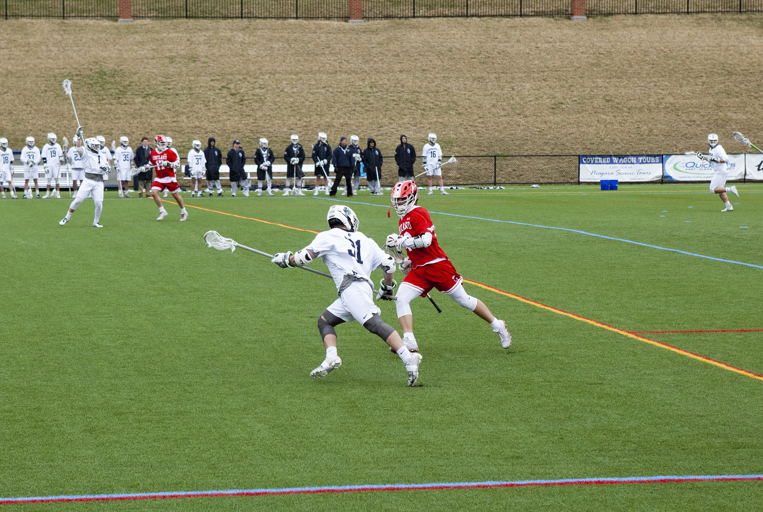Senior defender Jack Crowley (pictured above) takes on an opposing attacker in a game against SUNY Cortland on Wednesday April 10. Geneseo lost 13-11 to the top-ranked team in the conference (Udeshi Seneviratne/Photo Editor).