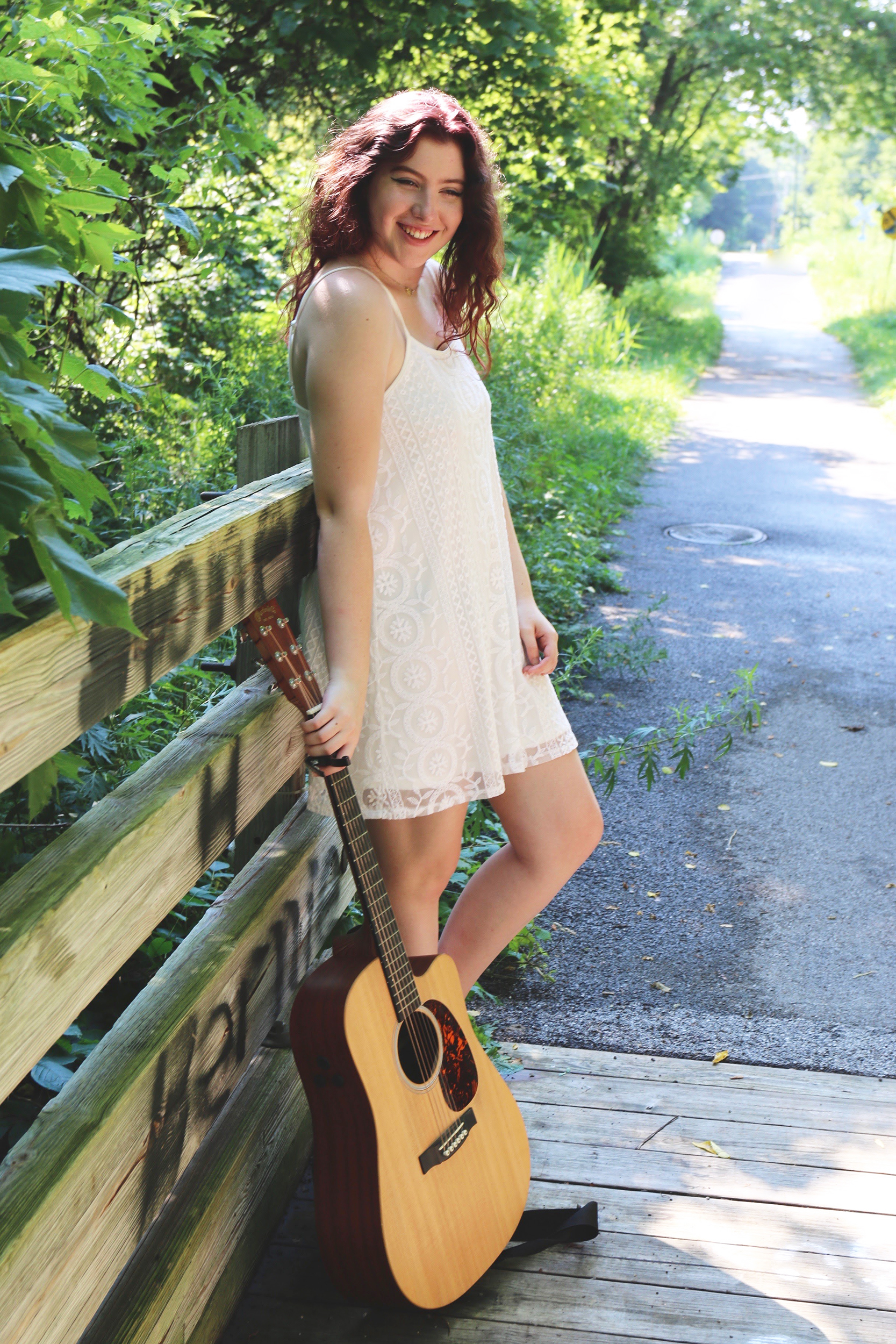English creative writing major freshman Katherine Johnson (pictured above) writes music and poetry in her spare time. Johnson plays guitar and sings her own songs along with covers at open mic nights. She hopes to produce an EP in the summer of 2019 (courtesy of Katherine Johnson).