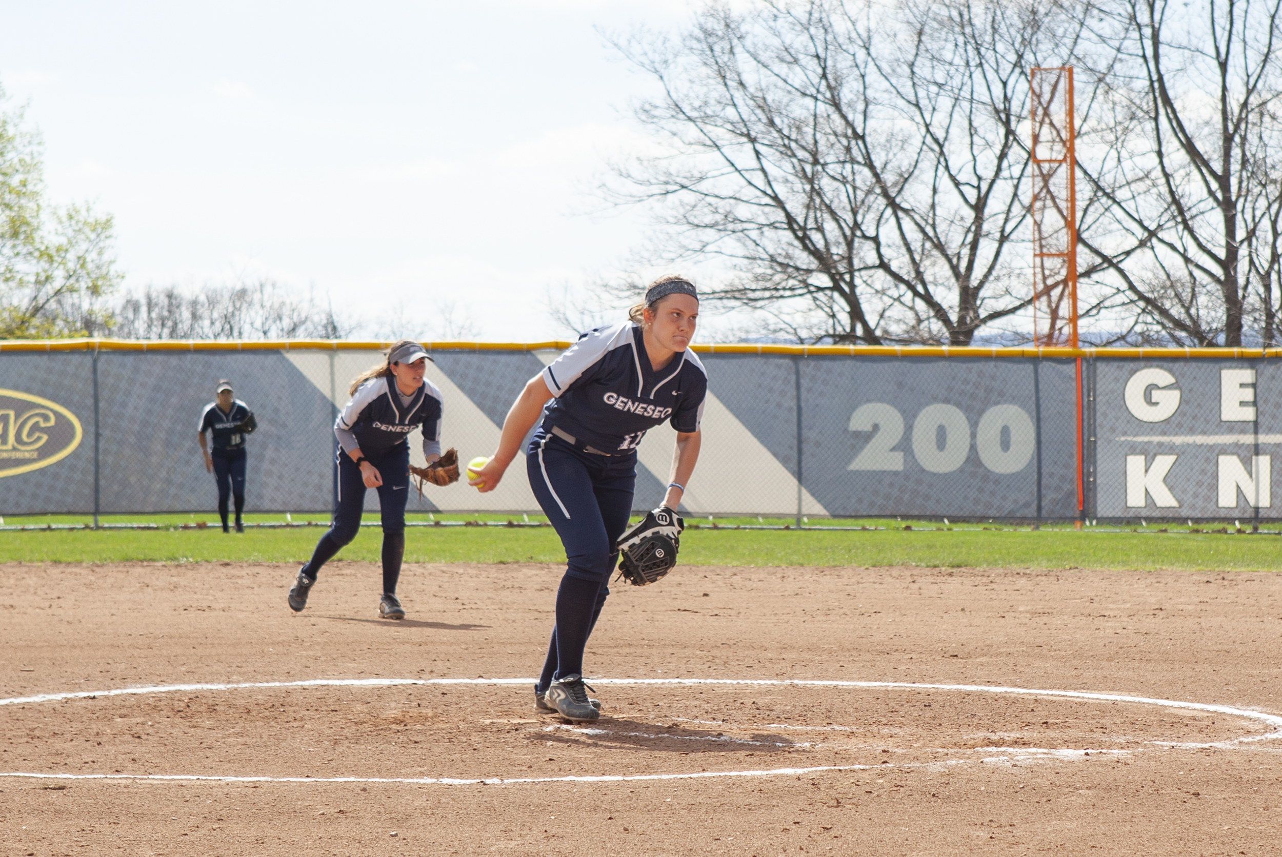 Sophomore pitcher Nicole Schwartz (pictured above) winds up for a pitch against the University of Rochester on Wednesday April 24. Geneseo defeated Rochester in both games of the doubleheader (Udeshi Seneviratne/Photo Editor).