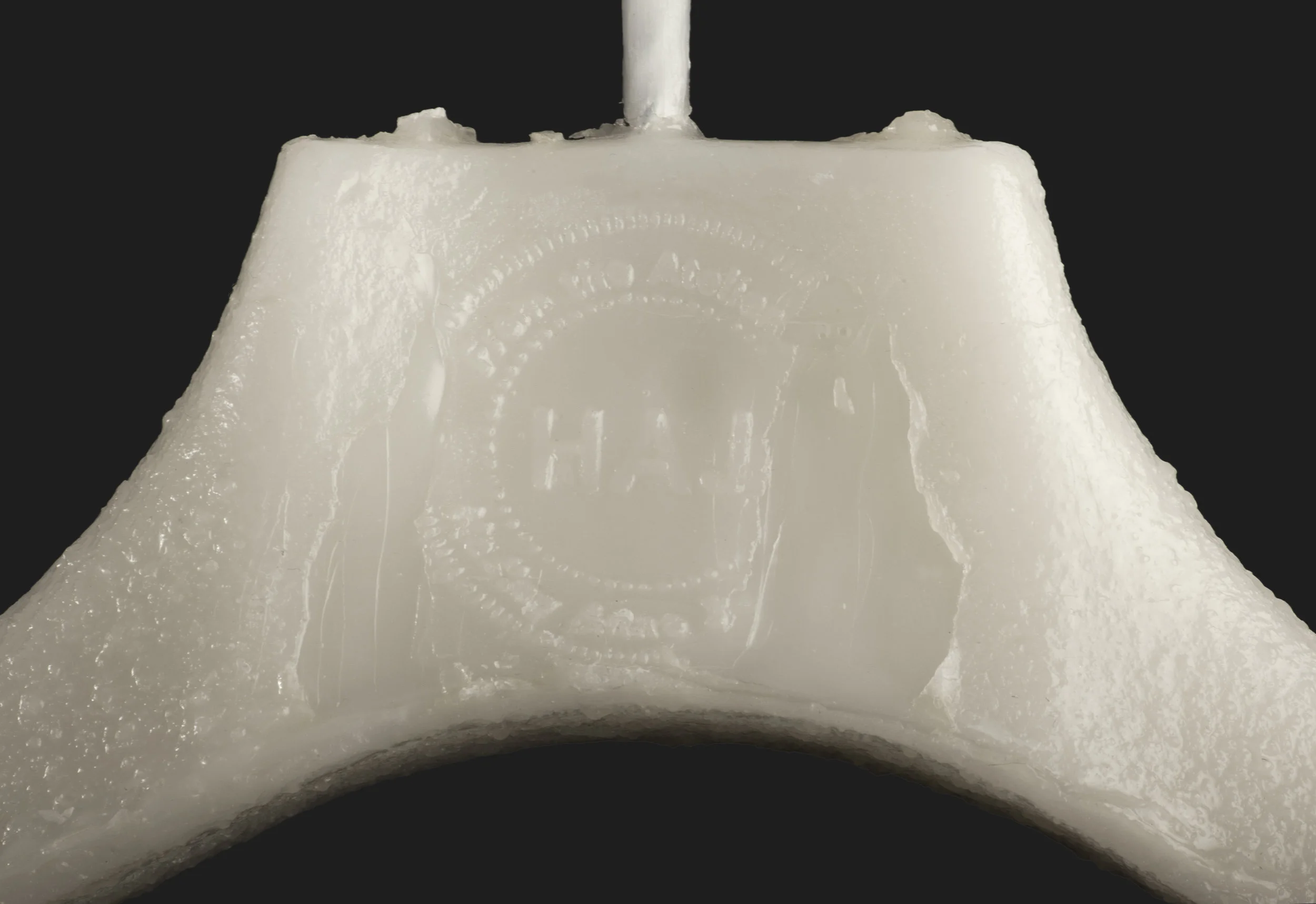 embossed beeswax hanger detail, 2010