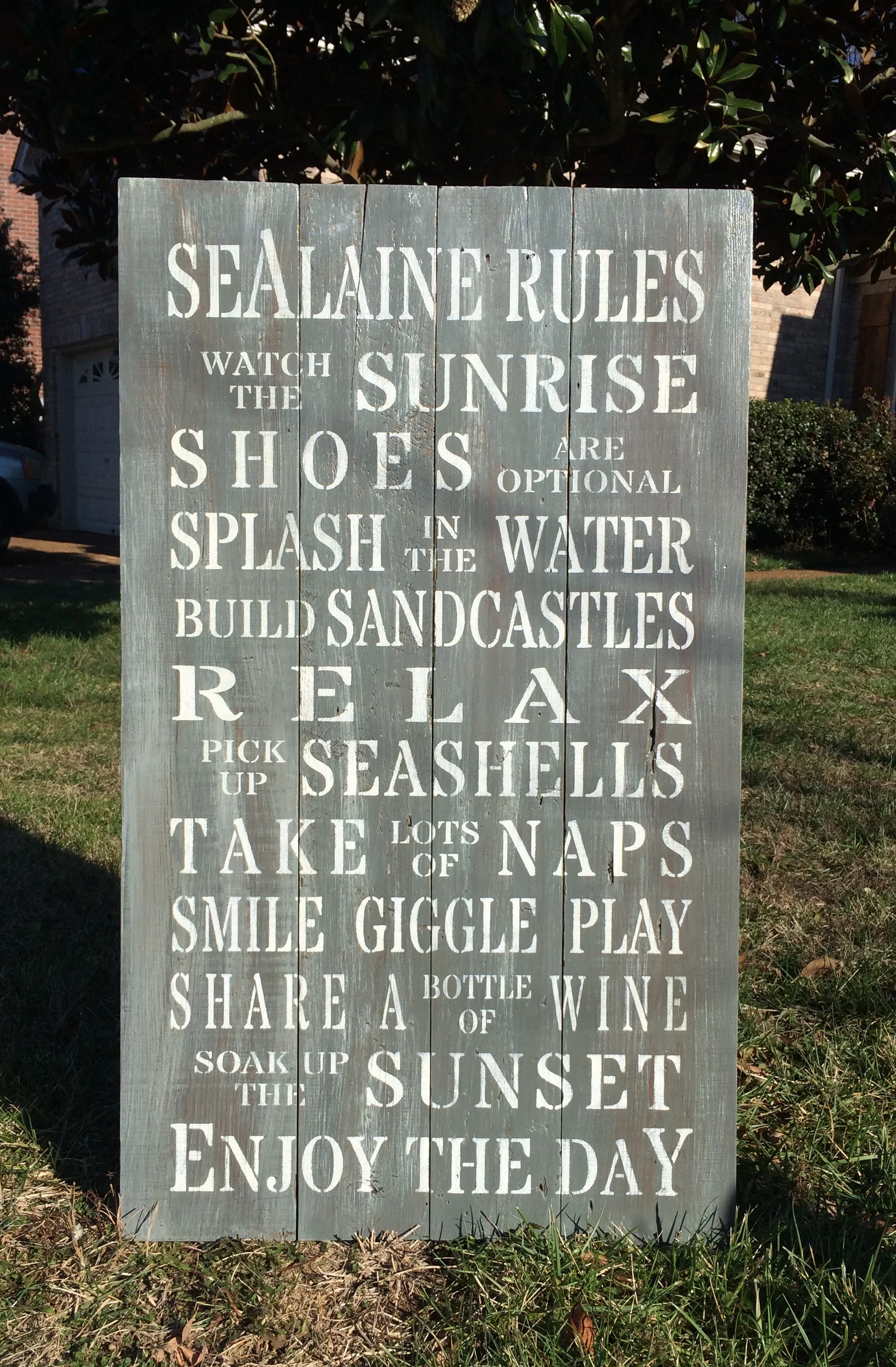 Gray with white wash, white block lettering