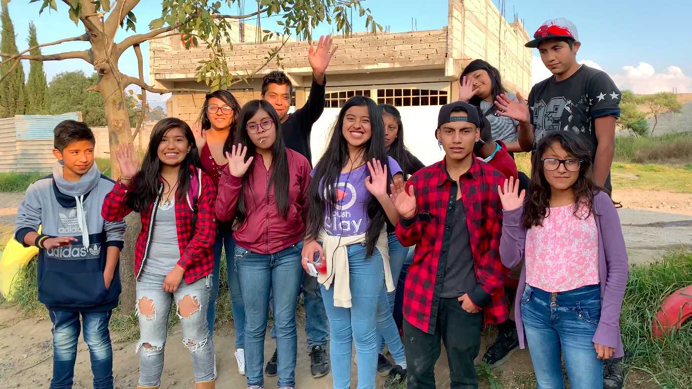 youth waving.png