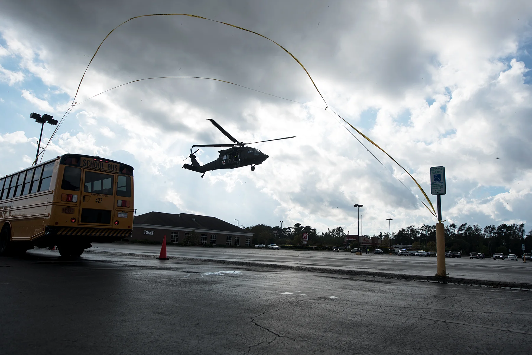 The United States National Guard and Coast Guard, bring evacuees mostly from Brunswick and Pender county, in the K&W parking lot in Wilmington, N.C., on September 18, 2018. These evacuees come from high flooded areas where the Cape Fear River is cresting over.