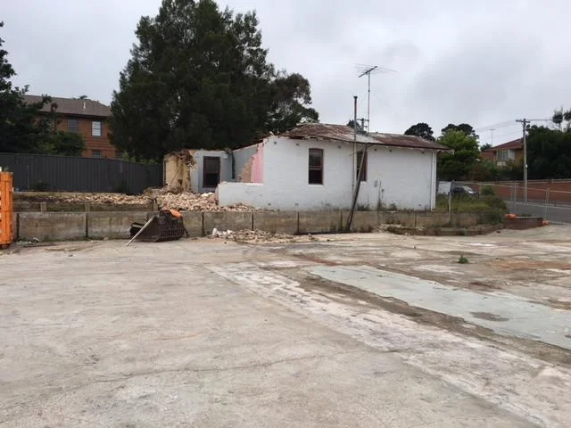 The half demolished brick cottage at the old Katoomba RSL site.