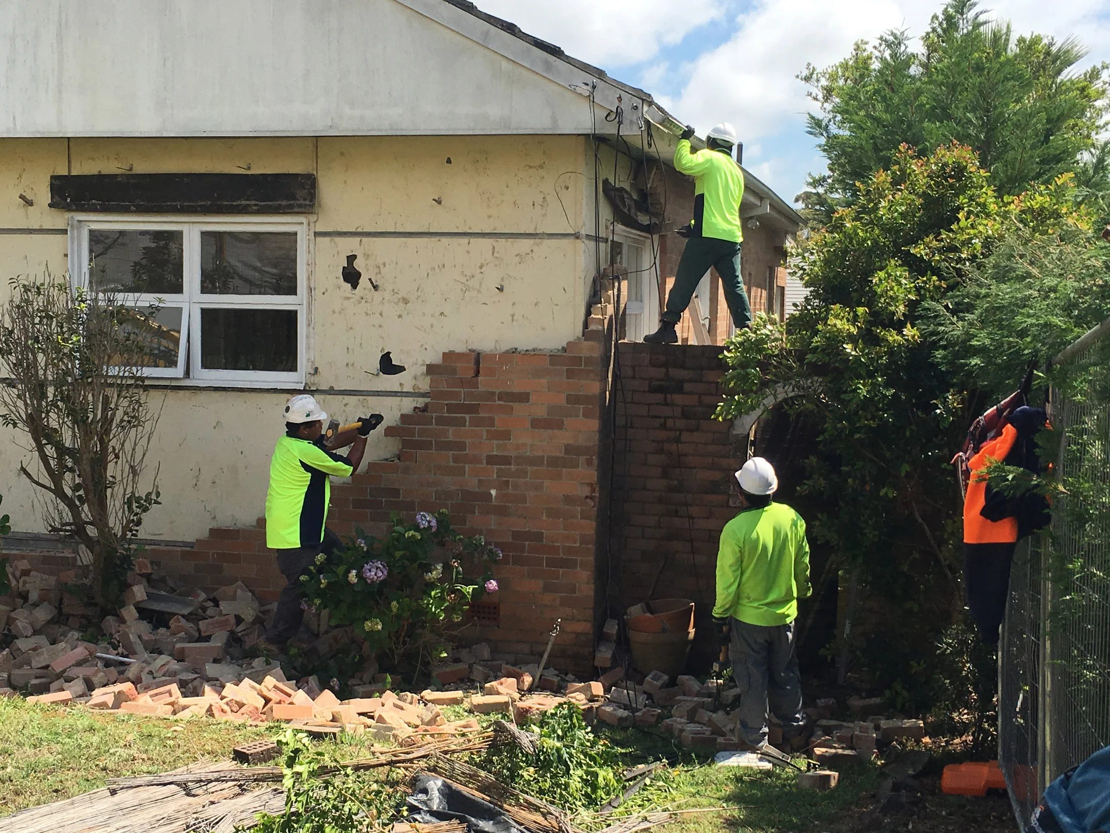 Asbestos has a habit of hiding where you least expect it, like behind this supposedly 'solid' brick wall.