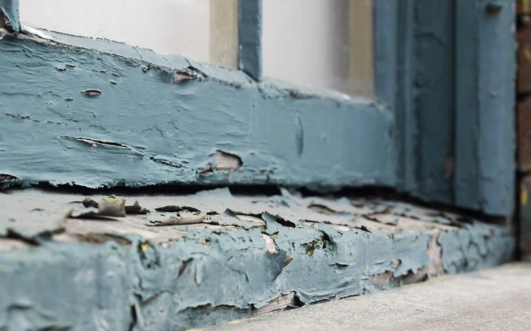 Windowsill with flaky lead paint .jpg